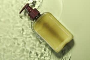 Moisturizing Dead Sea mud soap with natural minerals and nourishing ingredients for radiant skin, water splash effect, skincare, beauty, and wellness.