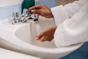 : person washing hands