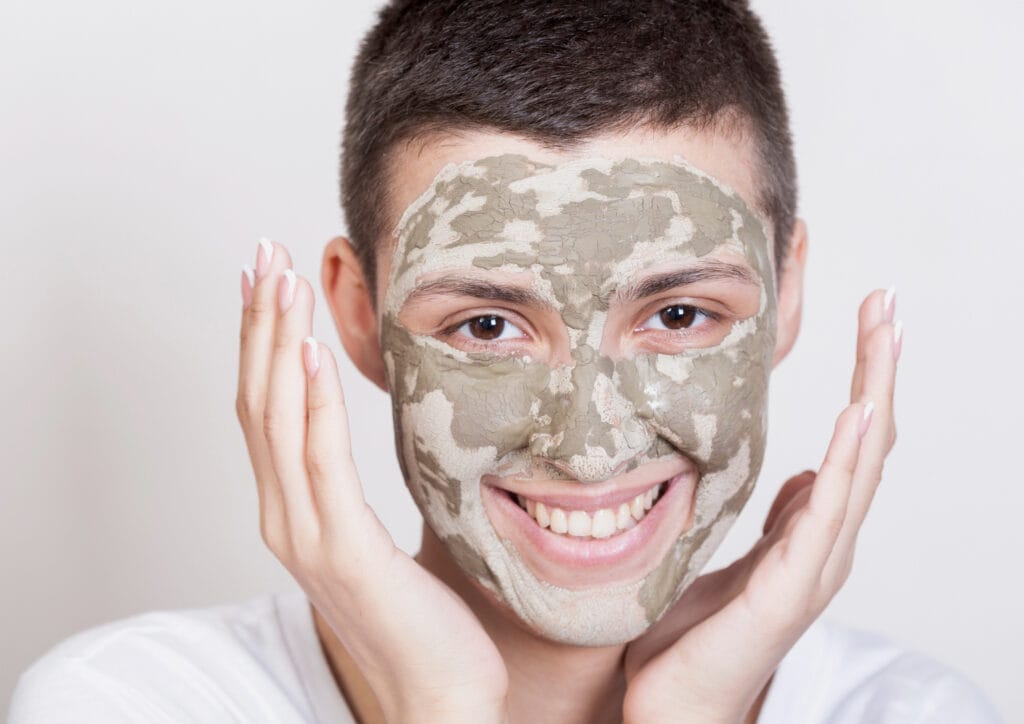 Applying Dead Sea mud mask on face step by step skincare routine